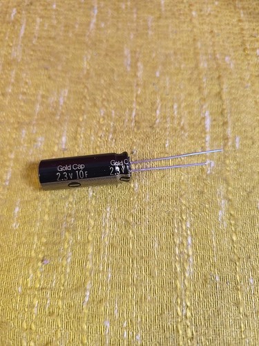 10f gold cap - 2.3v, -gold